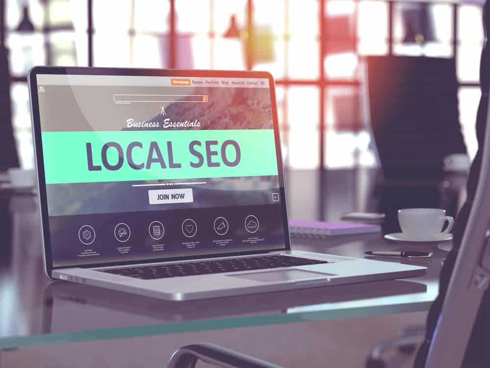 Local SEO for Construction Companies: Dominate Your Market 1 laptop computer with local seo across the screen